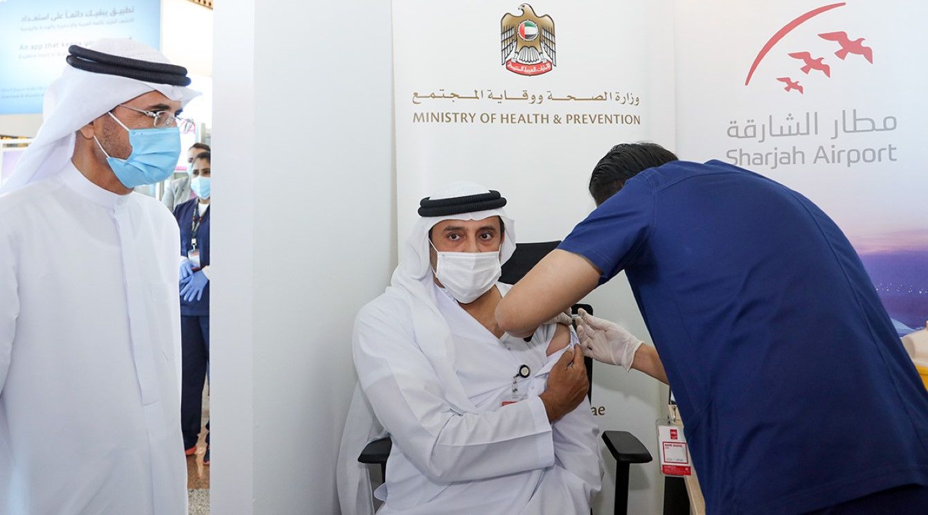 Sharjah Airport frontline staff receives first dose of COVID-19 vaccine: MoHAP