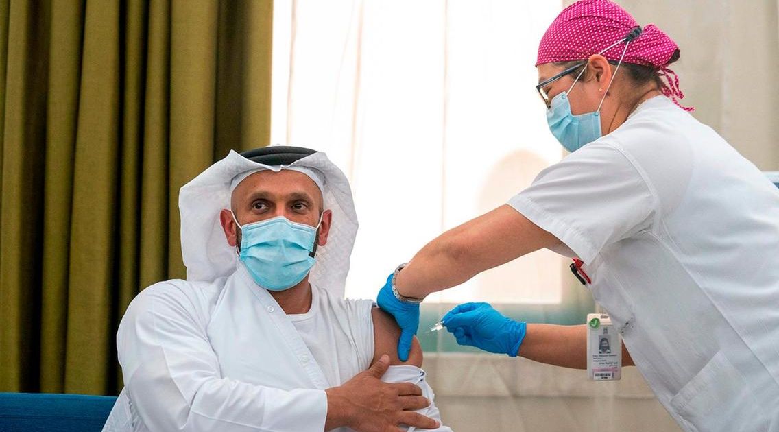 Coronavirus: Abu Dhabi health chief receives second Covid-19 vaccine shot as trial continues